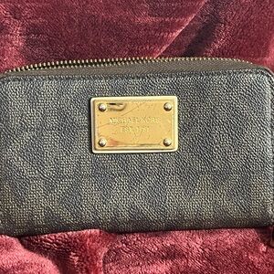Michael Kors Black Wallet with Gold Accents